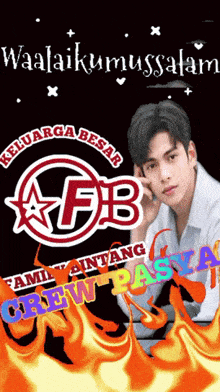 a man sitting in front of a logo that says keluarga besar