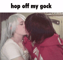 two women kissing with the words hop off my gock below them