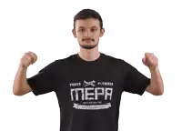 a man is flexing his muscles wearing a shirt that says proud plumber mepa