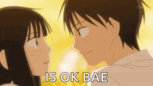 a man and a woman are looking at each other and the man is saying is ok bae .