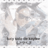 a picture of lucy solo de kaylee is surrounded by white lace