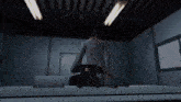a man in a suit is standing in a doorway in a video game .