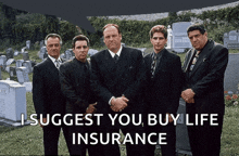 a group of men standing in front of a cemetery with the words i suggest you buy life insurance below them