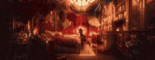 a blurry picture of a room with a bed and a chandelier .