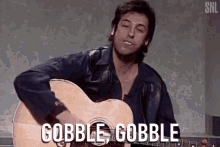 Gobble Gobble Singing GIF - Gobble Gobble Singing Playing Guitar GIFs