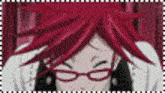 a close up of a person with red hair wearing glasses .