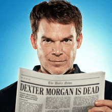 a man is reading a newspaper with the headline dexter morgan is dead