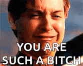 a man is crying with the words you are such a bitch