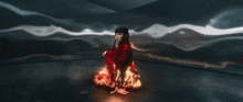 a person is on fire in a dark room with smoke coming out of it