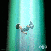 a poster for the movie elio shows a boy falling into the ocean