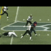a football player with the number 8 on his jersey is running down the field
