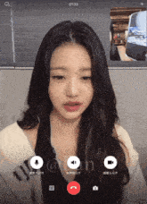 a woman is talking on a video call with a time of 01:33
