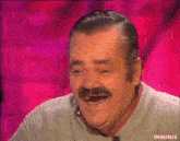 a man with a mustache is laughing in front of a pink background that says thinkjules on it