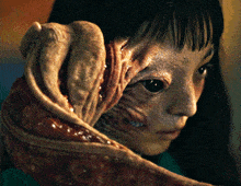 a close up of a person 's face with a strange face