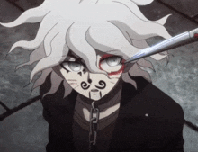 a cartoon character with a chain around his neck has a tattoo on his face