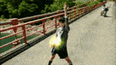 a girl in a school uniform stands on a bridge holding a yellow object