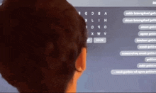 a person is looking at a screen with a few letters on it including the letters x and w