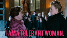 two women standing next to each other with the words " i am a tolerant woman " on the bottom