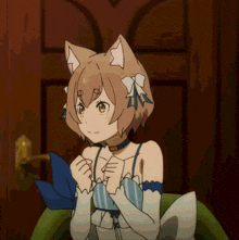 a girl with cat ears and a bow on her head