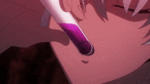a close up of a person holding a test tube with purple liquid
