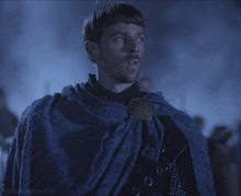 a man in a cape with the words lord aldhelm gifs on the bottom right