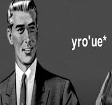 a black and white cartoon of a man in a suit and tie giving a thumbs up .
