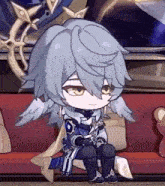 a chibi character is sitting on a couch in a video game .