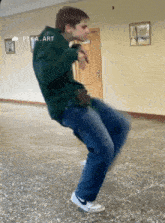 a young man is dancing in a hallway with pika art written on the bottom right