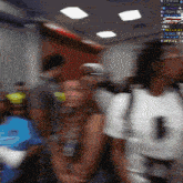 a blurry picture of a group of people with the number 1 on the front