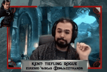 kent tiefling rogue is wearing headphones in front of a picture