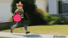 a cartoon of a man running with a strawberry on his head
