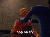 a video game character says " hop on tf2 " while standing next to another character
