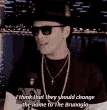 a man wearing sunglasses and a hat is saying that they should change the name to the brunagio