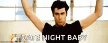 a man with his arms outstretched and the words date night baby behind him
