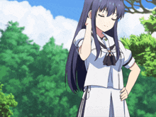 a girl with long dark hair is wearing a white uniform