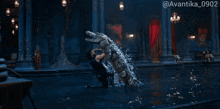 a picture of a crocodile jumping into a pool with the hashtag avantika_0902 on the bottom