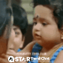 a baby is being held by a woman with the words star tamil chat on the bottom