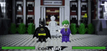 a lego batman and the joker are standing in front of an arkham asylum