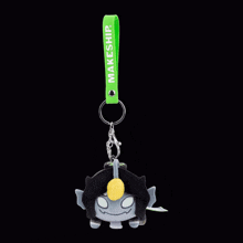 a keychain with a green makeship strap attached to it