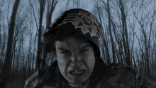 a man wearing a helmet with a soviet emblem on it