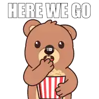 a teddy bear is holding a striped bucket of popcorn and says here we go