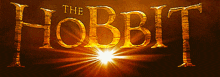the word hobbit is written in gold letters on a dark background