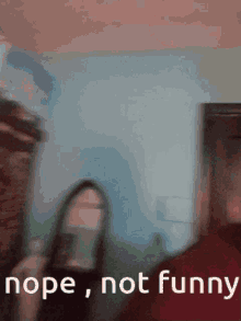 Nope Not Funny GIF - Nope Not Funny Eyeglasses GIFs