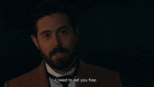 a woman in a white shirt says " i need to set you free "