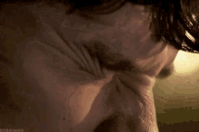 a close up of a man 's face with the word lichtblickpink visible
