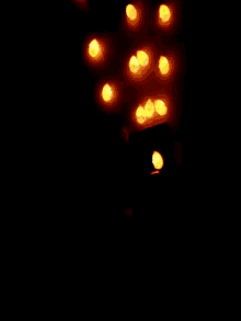 a bunch of lights are shining in the dark