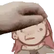 a hand is petting a cartoon character 's head with a sponge .