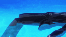 a person in a suit is swimming in a blue pool