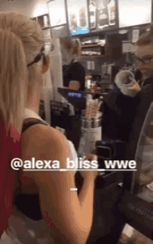Alexa Bliss Texting GIF - Alexa Bliss Texting Coffee Shop GIFs