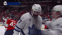 a toronto maple leafs hockey player wearing a number 7 jersey